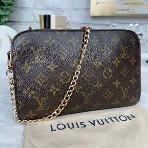 Louis Vuitton monogram orsay clutch crossbody bag with chain strap. Vintage